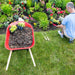 Phonak Stick 'n' Stay Hearing Aid Stickers (30 pair) 098-0353 Adhesives are great to use in the garden or when you are outdoors.  Man sitting on the lawn beside a flower bed. 