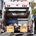 A garbage truck works down a busy street.  Everyone will sleep better if they have the Serenity Choice Reusable Hearing Protection for SLEEP Earplugs.