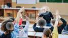 TriHear LiberMore Hearing Amplifier System can be worn by several students to listen to the instructor as they wear the remote microphone.  