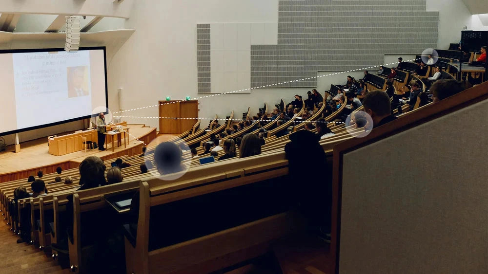 TriHear LiberMore Hearing Amplifier System with Remote Microphone. Audio Amplifier transmits the spoken words of a proffessor in a large theater classroom.  