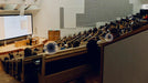 TriHear LiberMore Hearing Amplifier System with Remote Microphone. Audio Amplifier transmits the spoken words of a proffessor in a large theater classroom.  